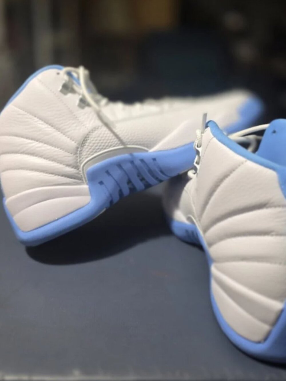 Jordan 12 Retro Melo White and Light Blue Sneakers
